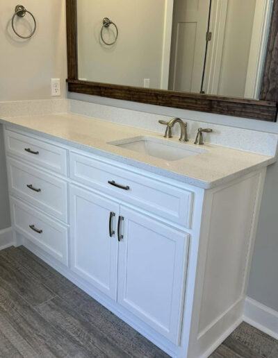 bathroom cabinet with sink and mirror