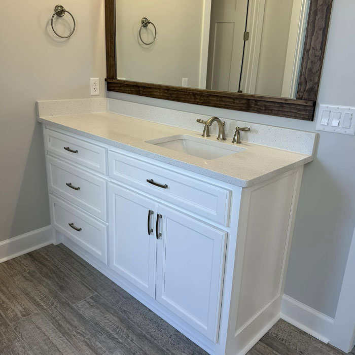 bathroom cabinet with sink and mirror